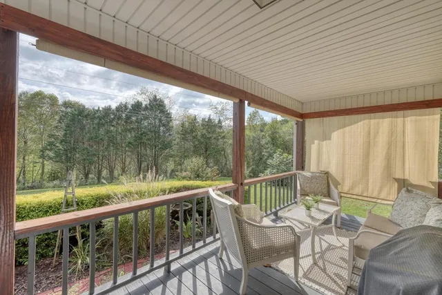 a view of a garden with a building in the background