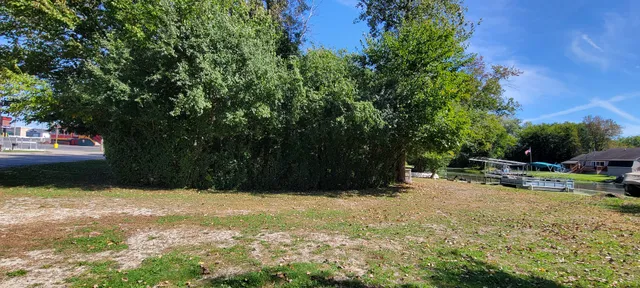 a view of swimming pool with a yard