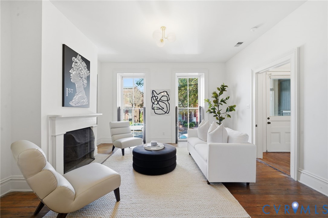 407 West Clay Street, Unit C Richmond, VA 23220 - Photo 3 of 12 Living room with a fireplace and hardwood / wood-s