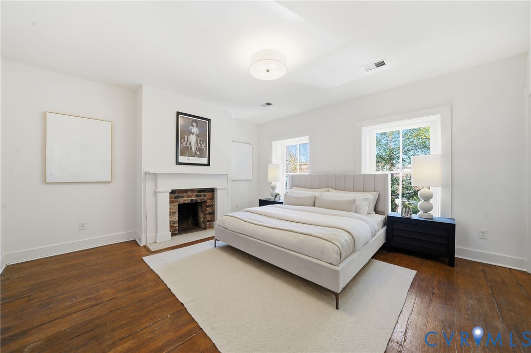 407 West Clay Street, Unit C Richmond, VA 23220 - Photo 8 of 12 Bedroom featuring dark wood finished floors and a