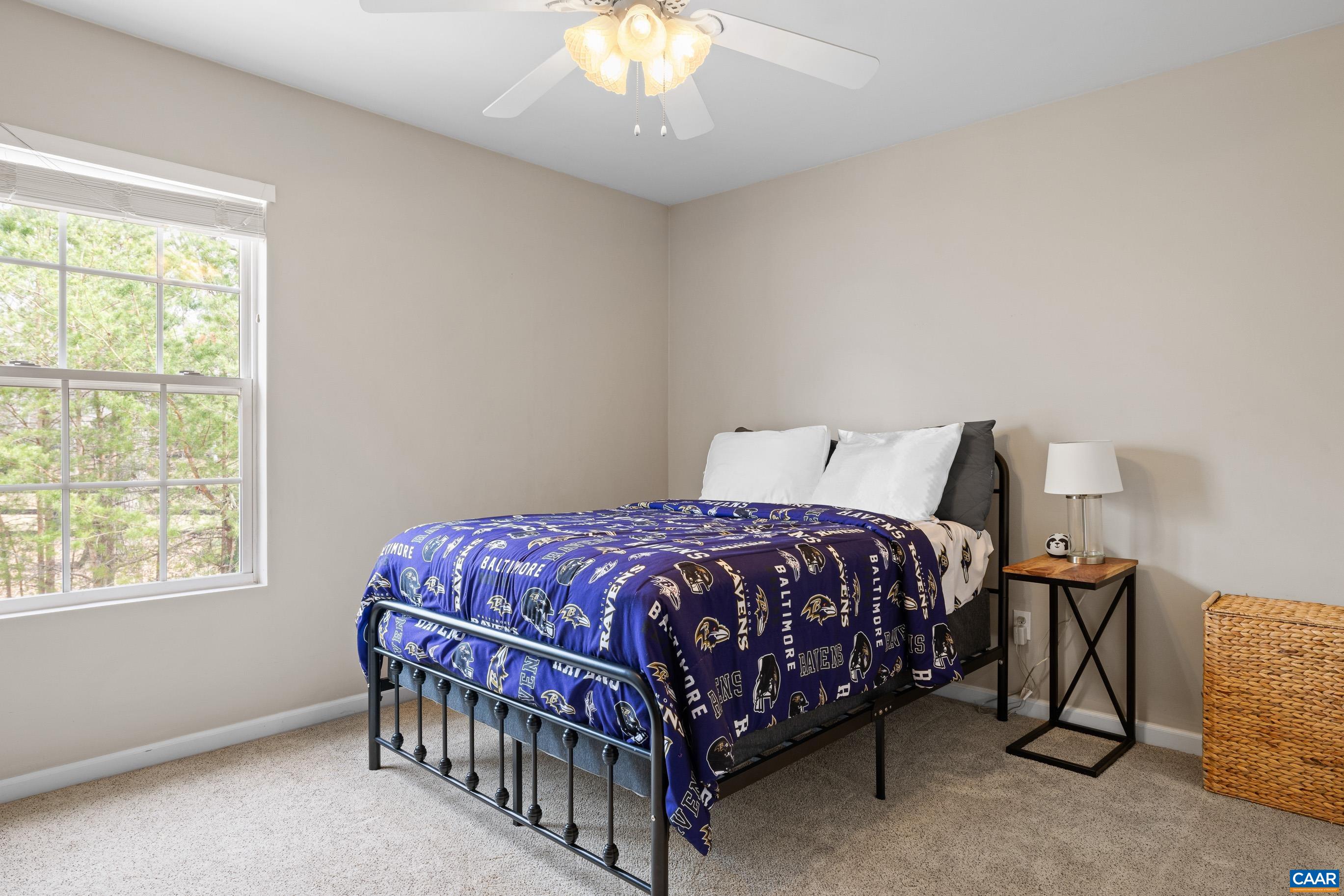 17 Hopi Way Palmyra, VA 22963 - Photo 26 of 36 a large bed sitting in a bedroom next to a window