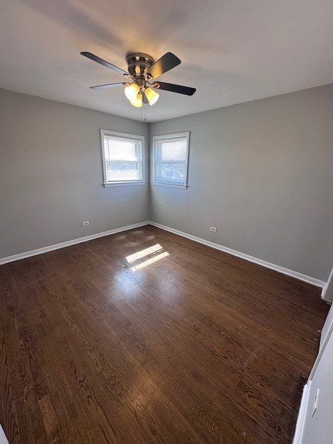 2907 West 59th Street, Unit 3S Chicago, IL 60629 - Photo 7 of 9 a view of an empty room with a window and wooden floor