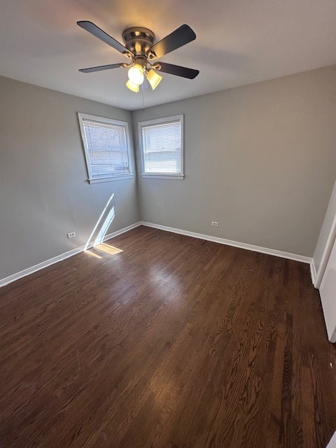 2907 West 59th Street, Unit 3S Chicago, IL 60629 - Photo 8 of 9 a view of an empty room with a window and wooden floor