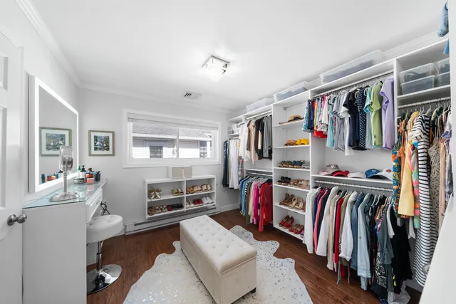 a view of workspace with wooden floor and windows