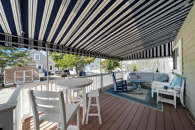 a balcony with furniture