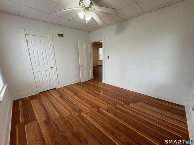 a bathroom with a sink a toilet and a shower