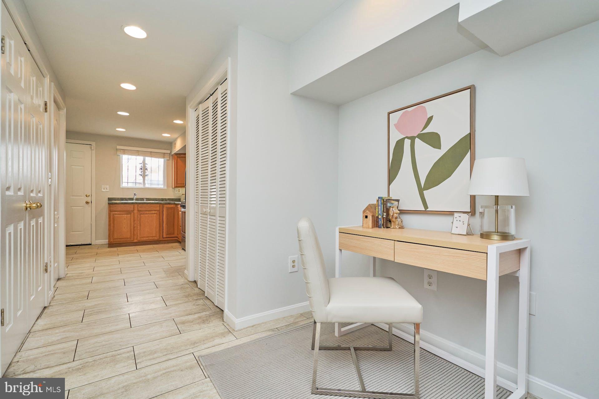 1313 K Street Southeast Washington, DC 20003 - Photo 12 of 48 a view of a hallway to room with wooden floor
