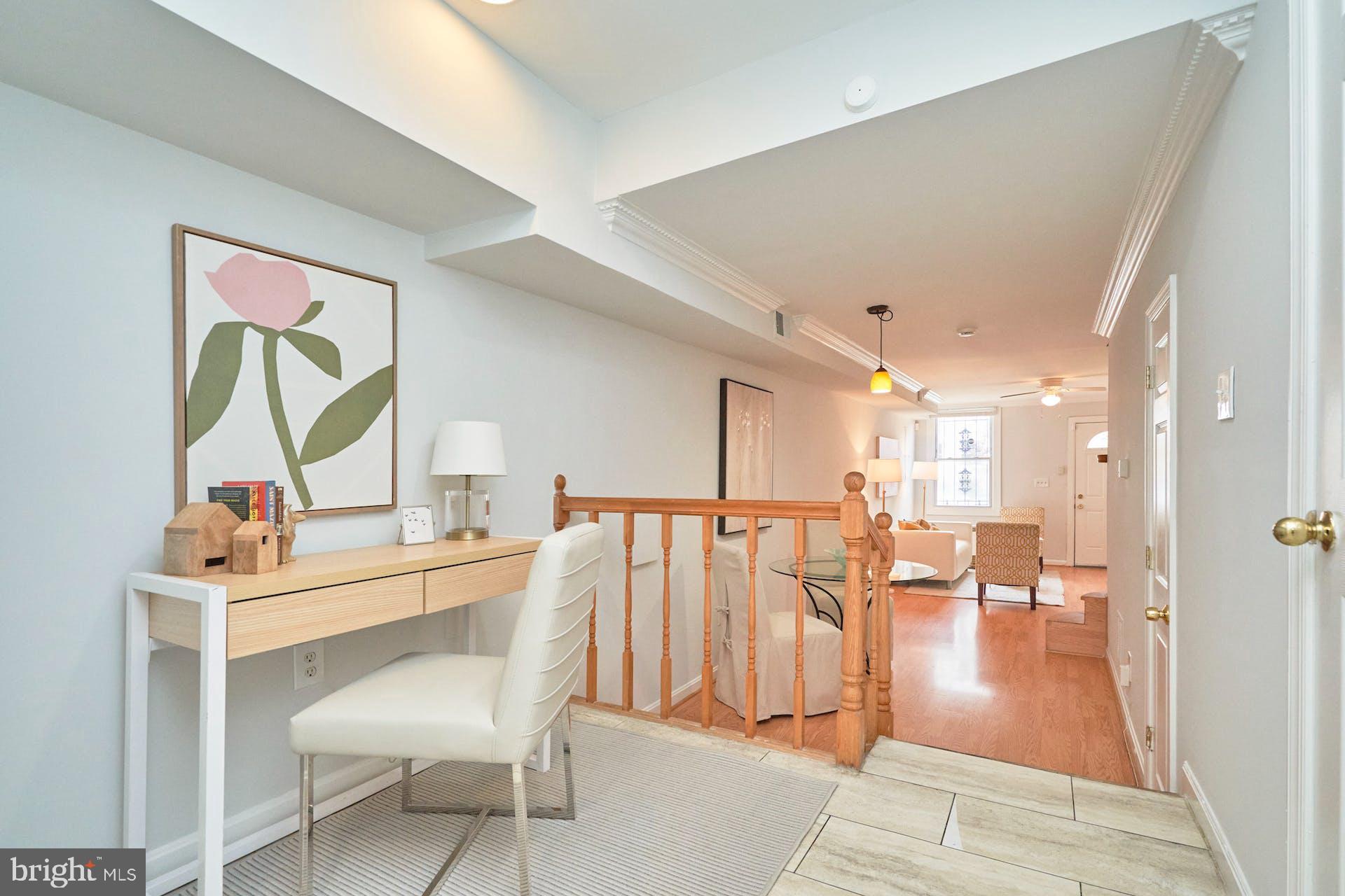 1313 K Street Southeast Washington, DC 20003 - Photo 13 of 48 a dining room with furniture and a wooden floor