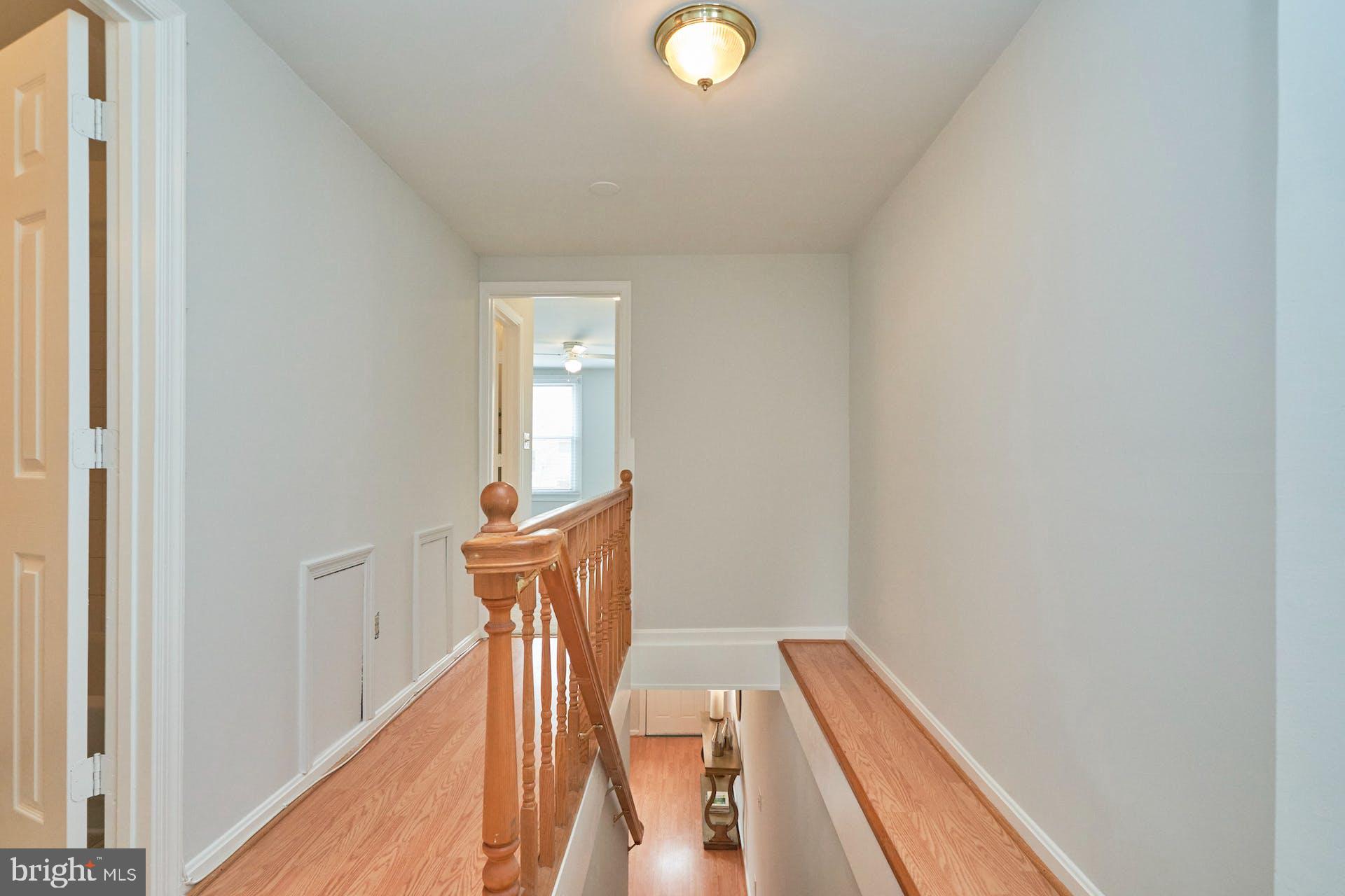 1313 K Street Southeast Washington, DC 20003 - Photo 21 of 48 a view of a hallway with wooden floor and entryway