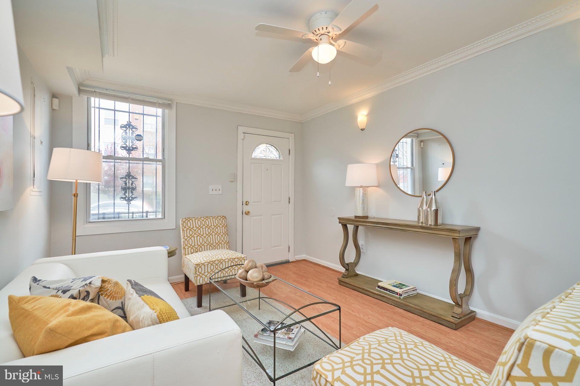 1313 K Street Southeast Washington, DC 20003 - Photo 6 of 48 a living room with furniture and a window
