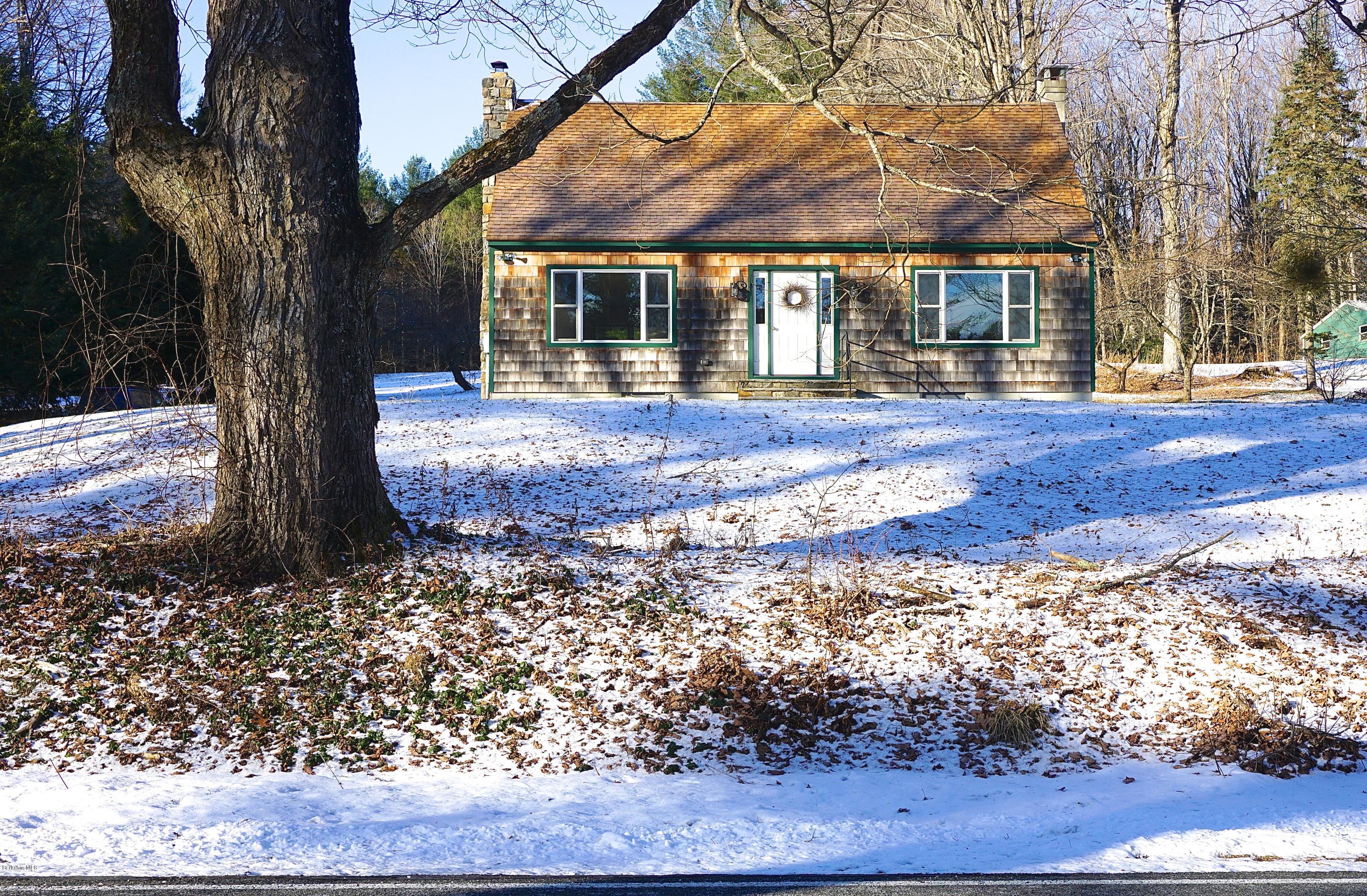 38 Sandisfield Road Monterey, MA 01245 - Photo 2 of 25 front view of a house with a yard