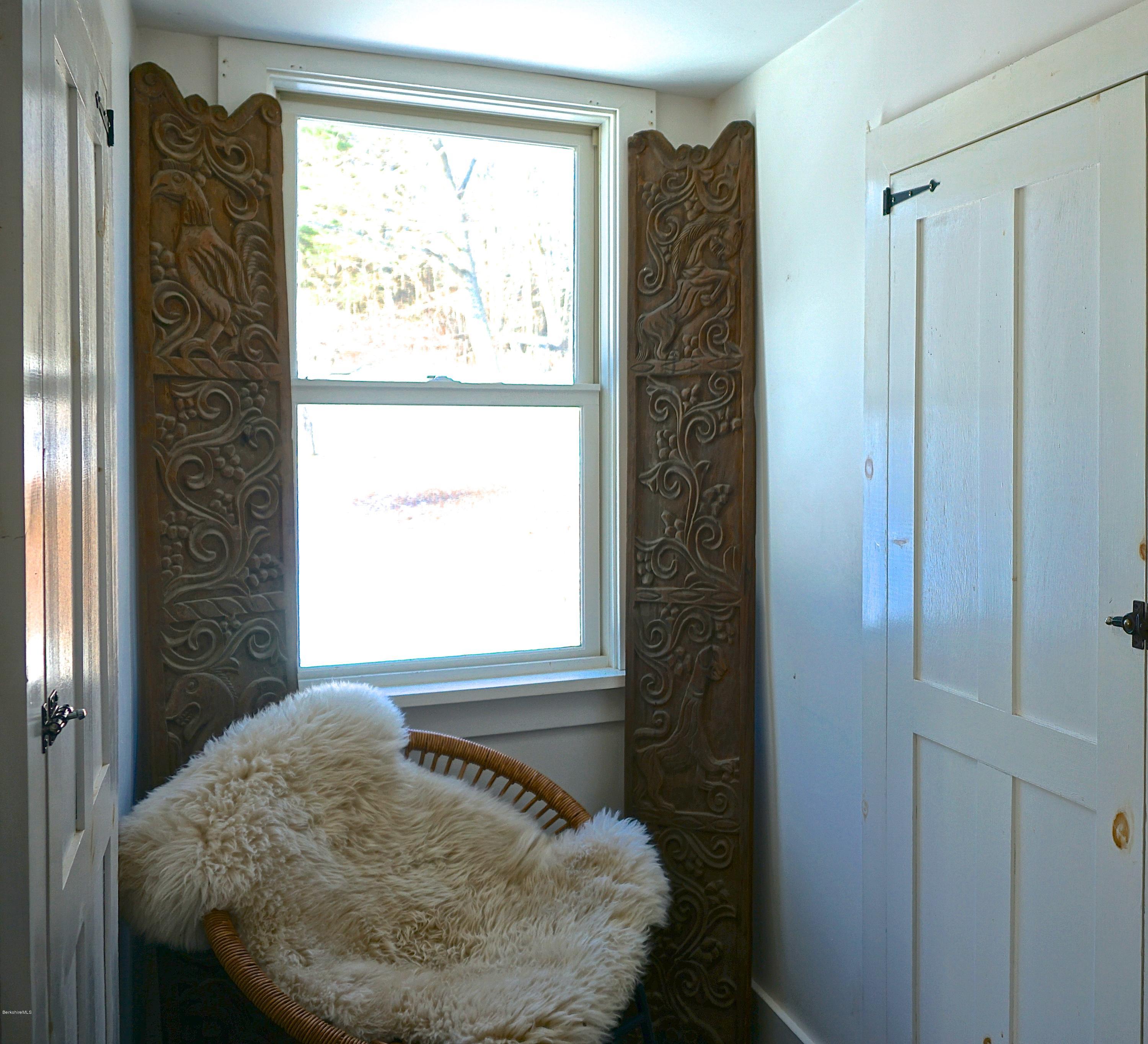 38 Sandisfield Road Monterey, MA 01245 - Photo 17 of 25 a bathroom with a sink and a mirror