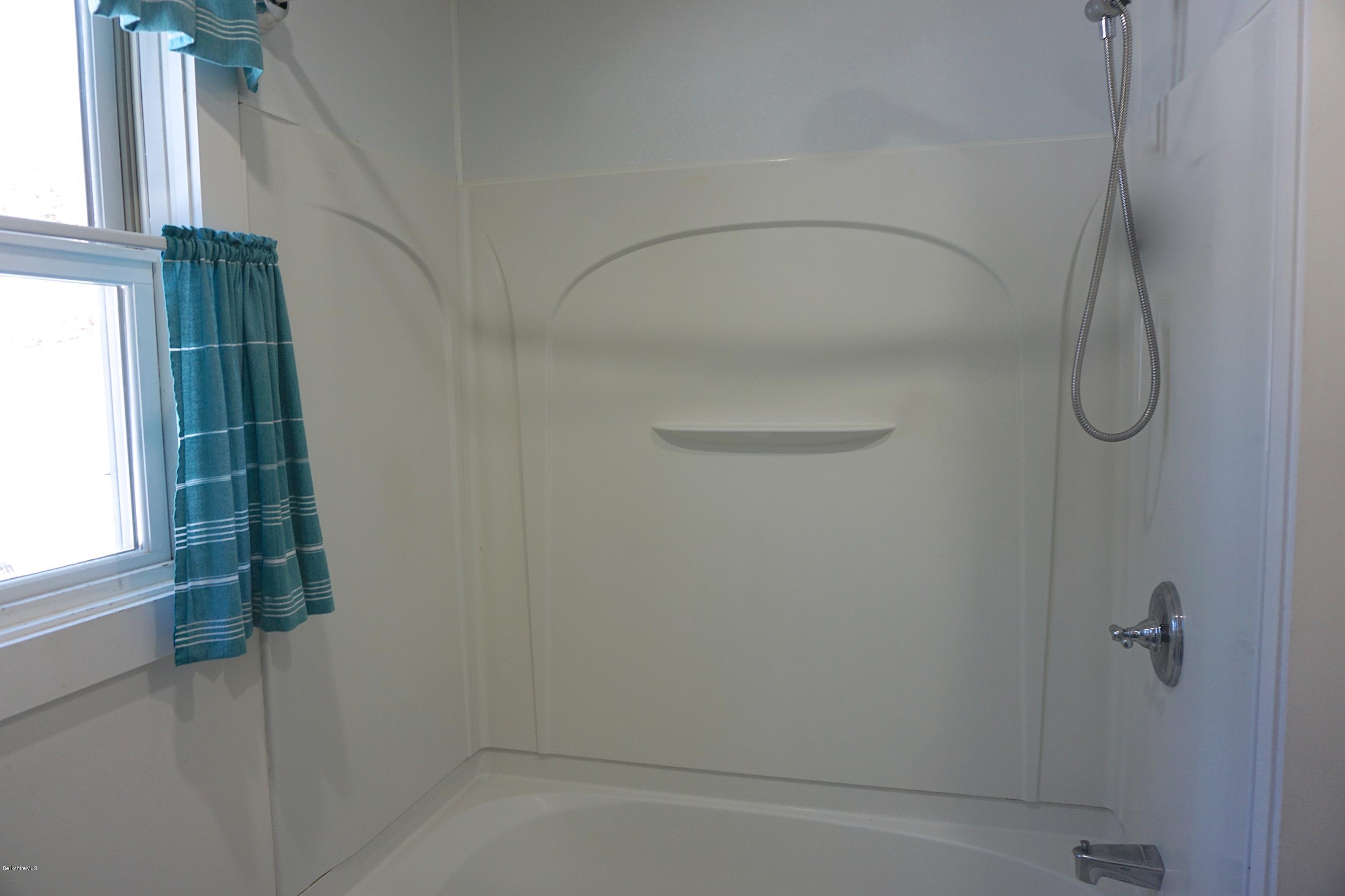 38 Sandisfield Road Monterey, MA 01245 - Photo 21 of 25 a bathroom with a shower