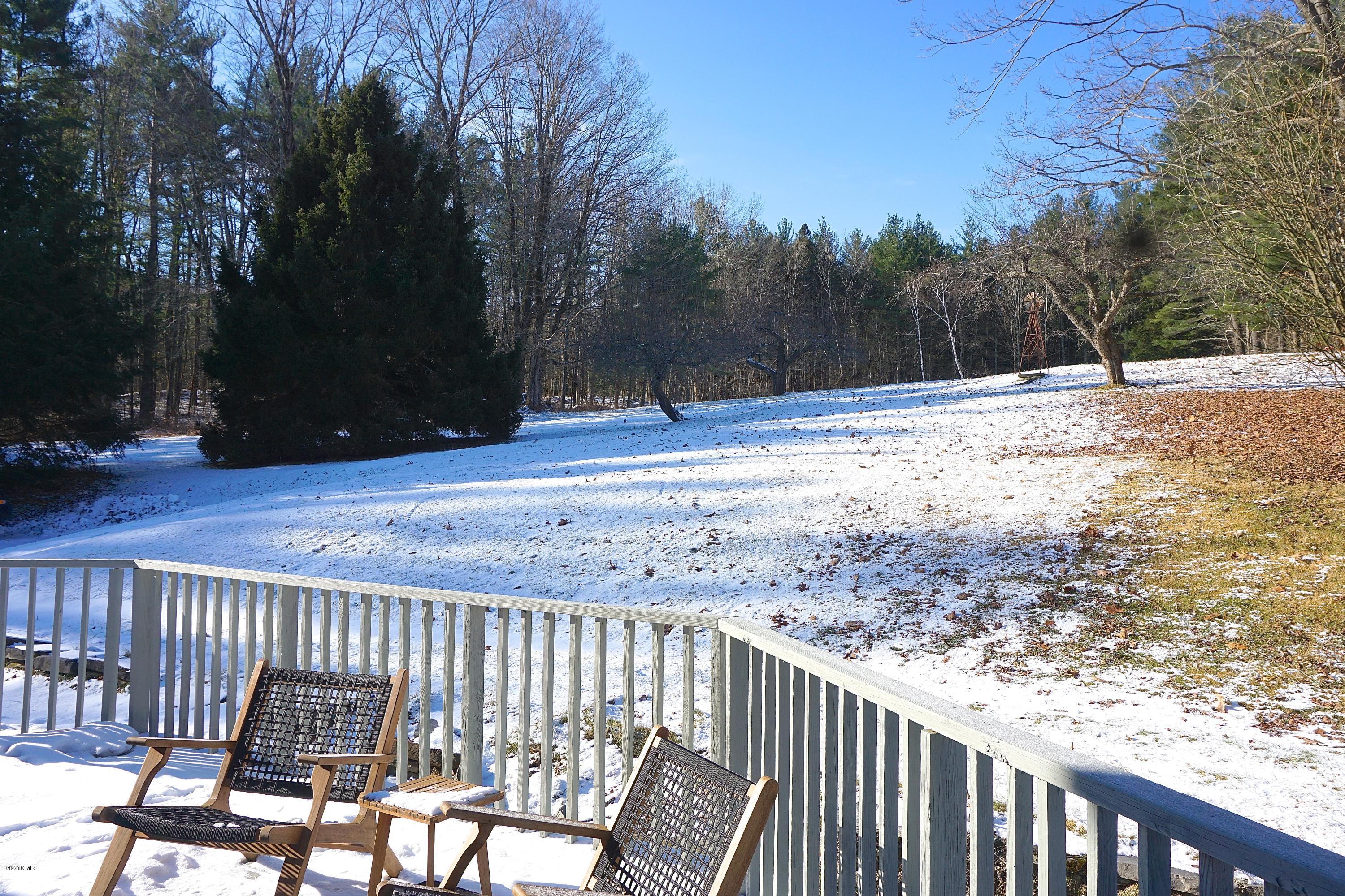 38 Sandisfield Road Monterey, MA 01245 - Photo 23 of 25 a view of a yard with wooden fence