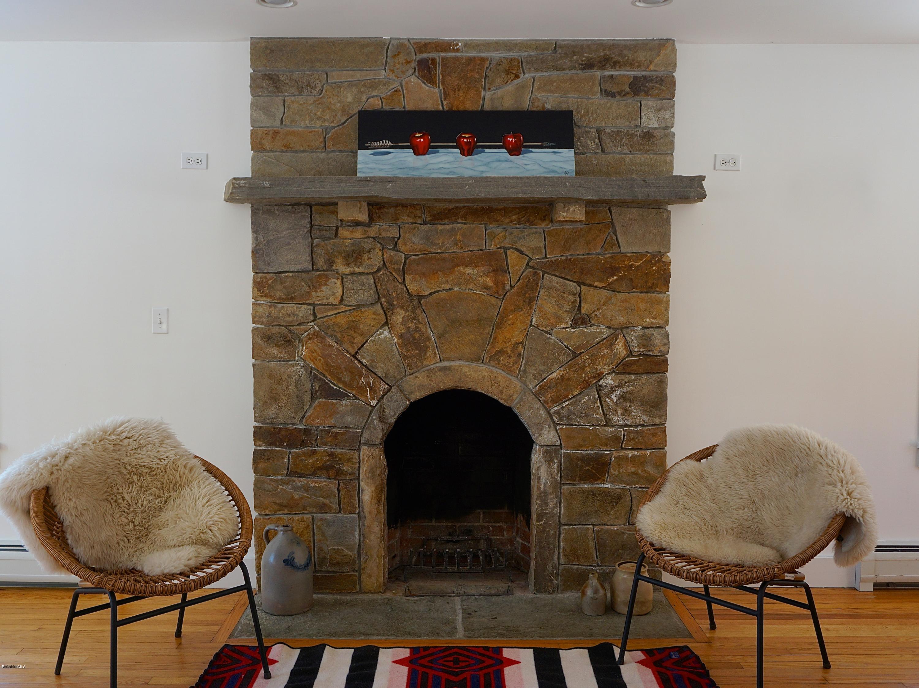 38 Sandisfield Road Monterey, MA 01245 - Photo 9 of 25 a living room with furniture and a fireplace