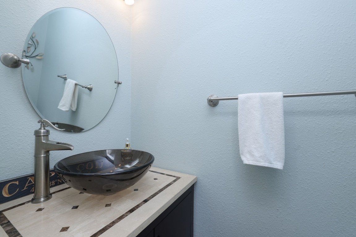 8827 Stoney Bend Drive Spring, TX 77379 - Photo 20 of 39 a bathroom with a sink and a mirror
