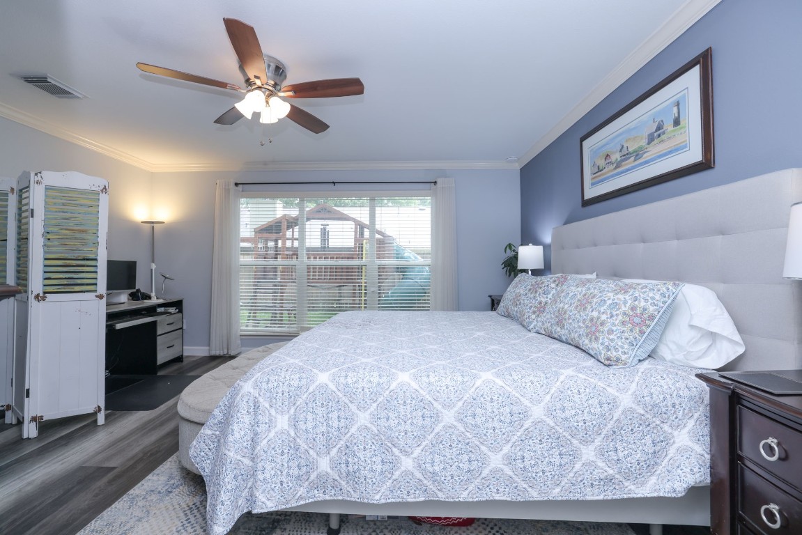 8827 Stoney Bend Drive Spring, TX 77379 - Photo 23 of 39 a bedroom with a large bed and a window