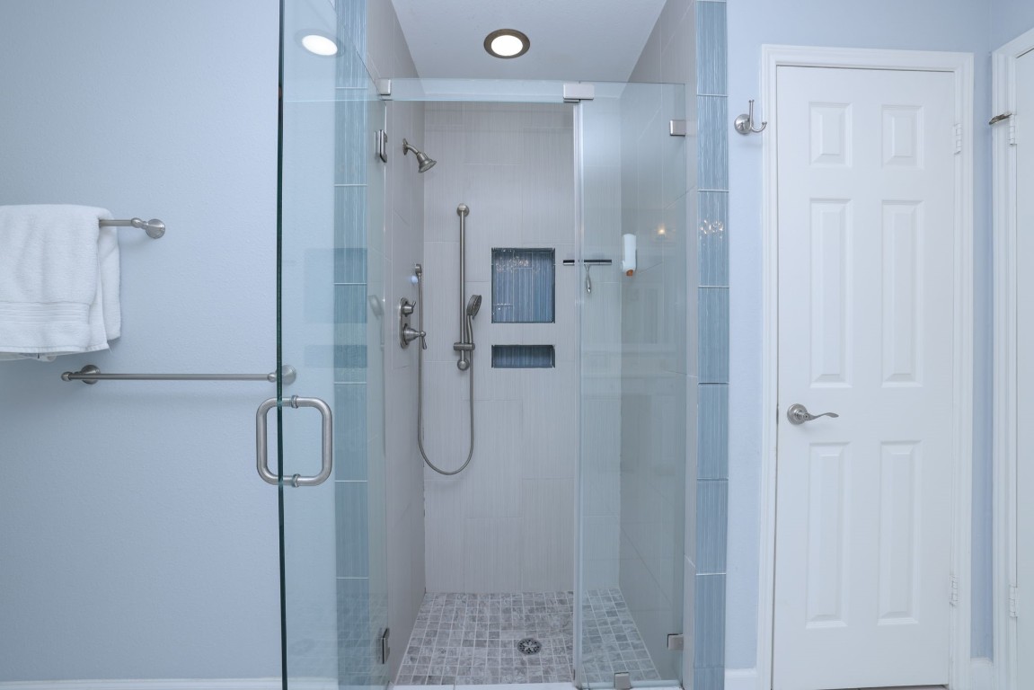 8827 Stoney Bend Drive Spring, TX 77379 - Photo 25 of 39 a bathroom with a shower