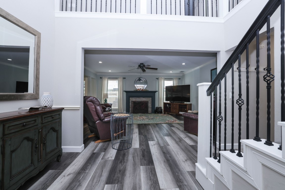 8827 Stoney Bend Drive Spring, TX 77379 - Photo 5 of 39 a living room with furniture and a fireplace
