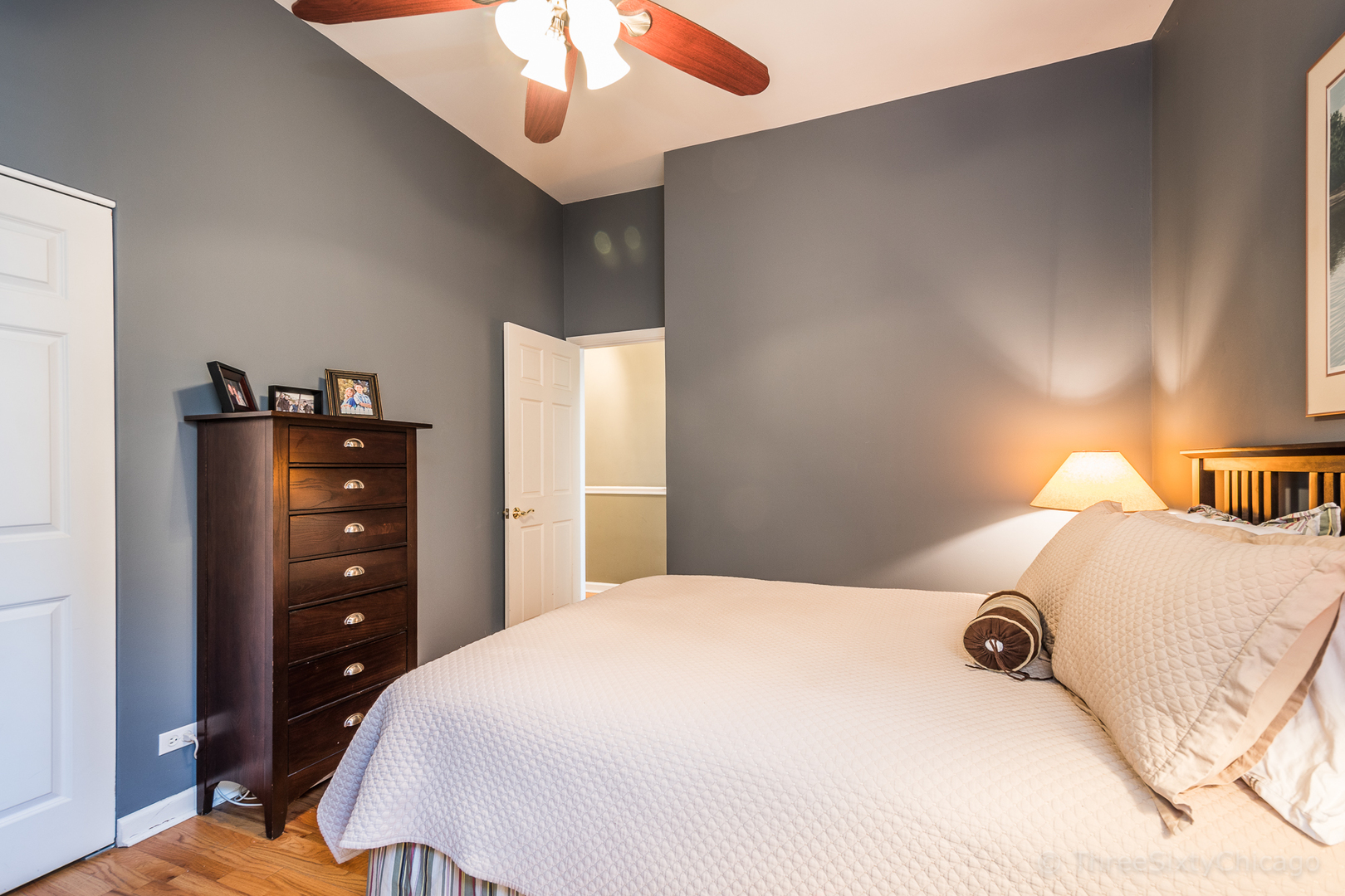 4028 North Sheridan Road, Unit 3 Chicago, IL 60613 - Photo 12 of 25 a bedroom with a bed and a closet