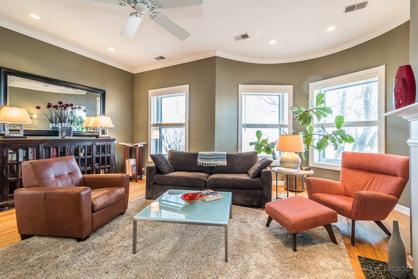 4028 North Sheridan Road, Unit 3 Chicago, IL 60613 - Photo 3 of 25 a living room with furniture and a large window
