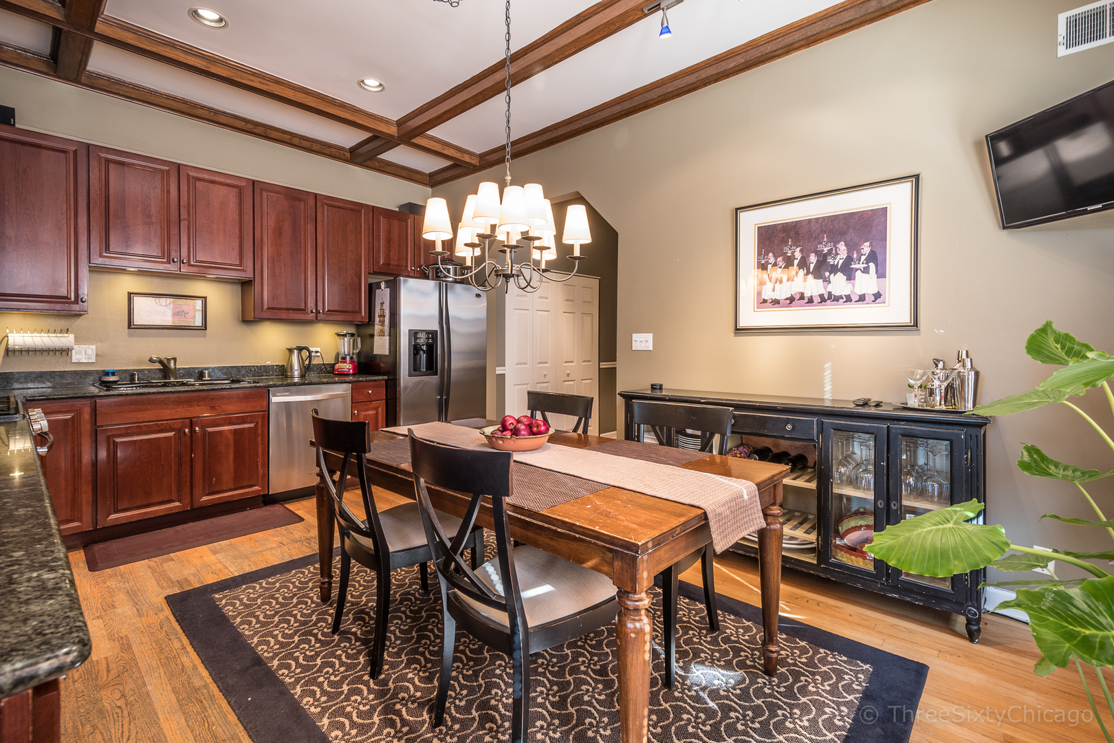 4028 North Sheridan Road, Unit 3 Chicago, IL 60613 - Photo 7 of 25 a view of a dining room with furniture