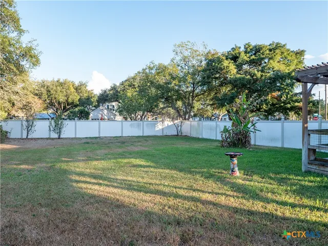 a view of a house with a big yard