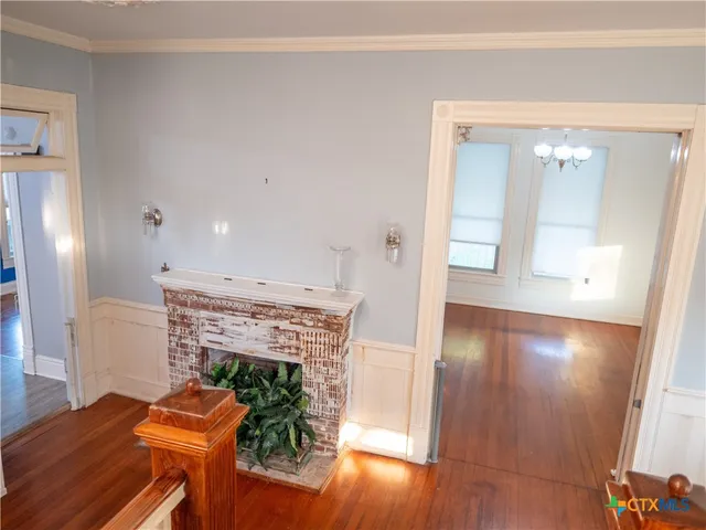 a view of livingroom with furniture and wooden floor