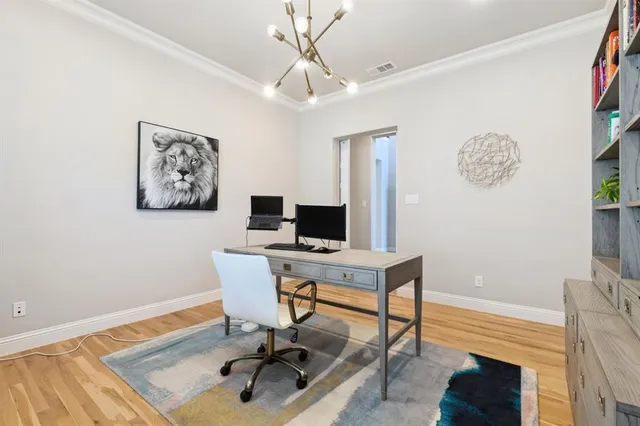 a workspace with furniture and a window