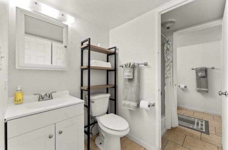 111 Kahului Beach Road, Unit B112 Kahului, HI 96732 - Photo 11 of 15 a bathroom with a sink toilet and shower