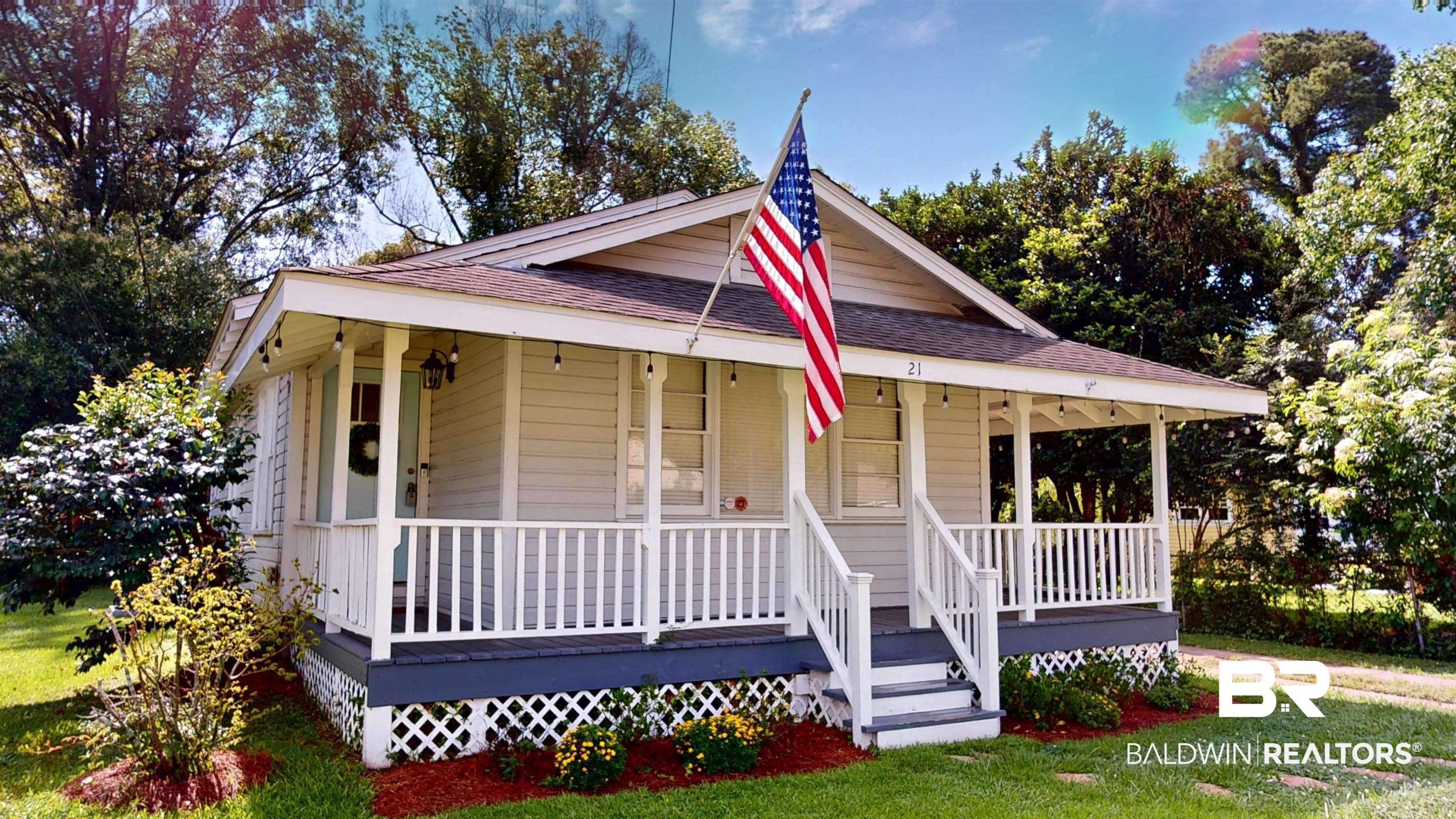 21 Crenshaw Street Mobile, AL 36606 - Photo 21 of 22 Farmhouse with a porch, a shingled roof, and a front lawn