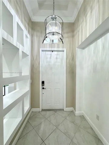 a utility room with sink dryer and washer
