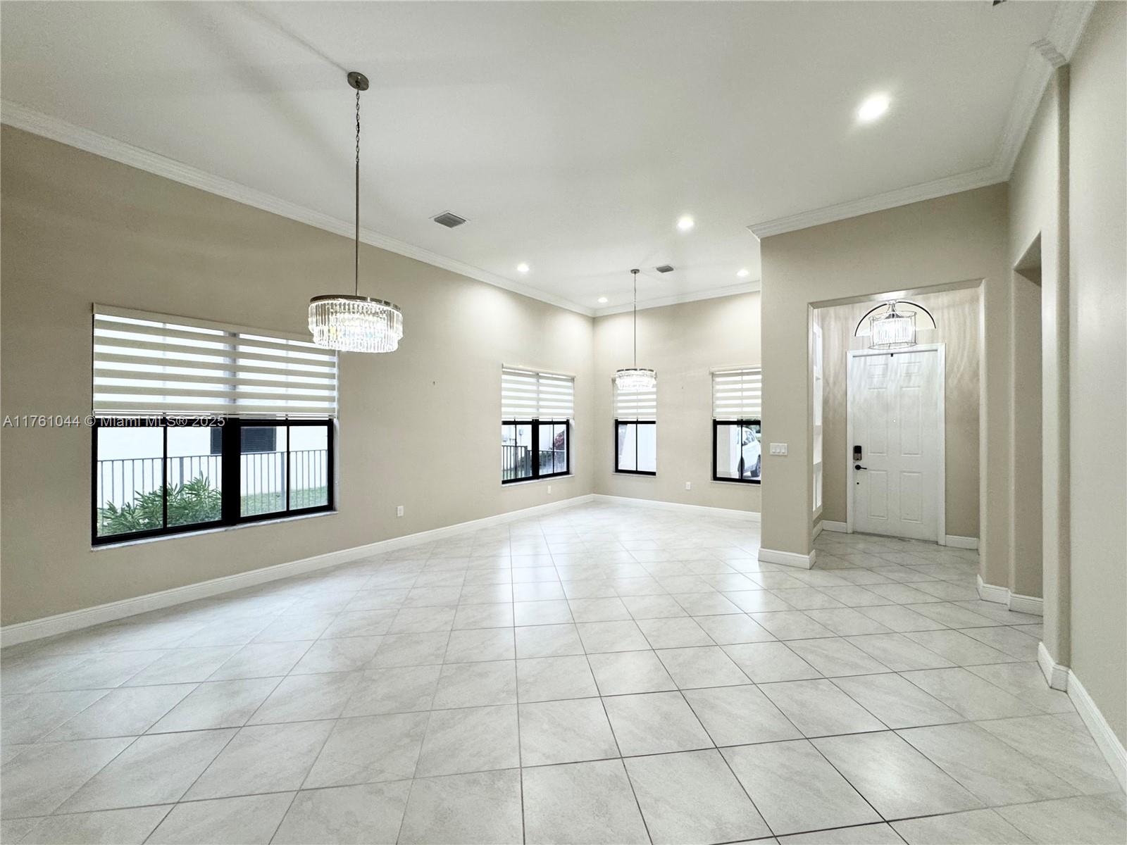 5008 Salerno Street Ave Maria, FL 34142 - Photo 9 of 46 a view of an empty room and window