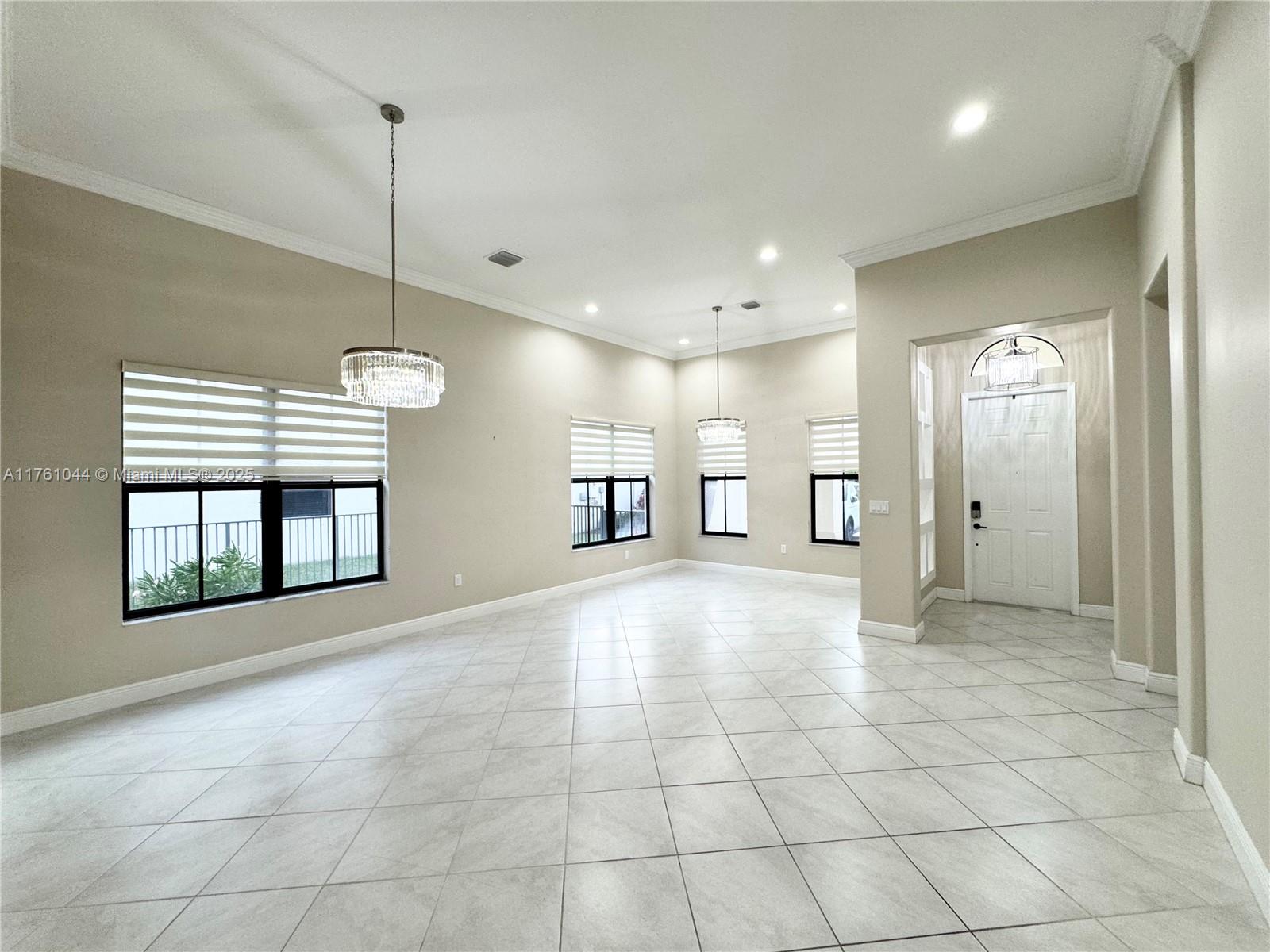 5008 Salerno Street Ave Maria, FL 34142 - Photo 10 of 46 a view of an empty room with a window