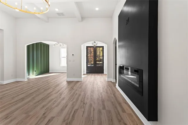 a view of entryway with wooden floor and stairs