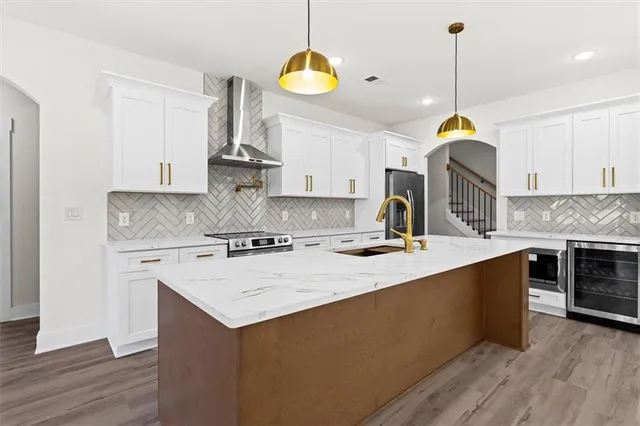 a bathroom with a double vanity sink mirror and shower