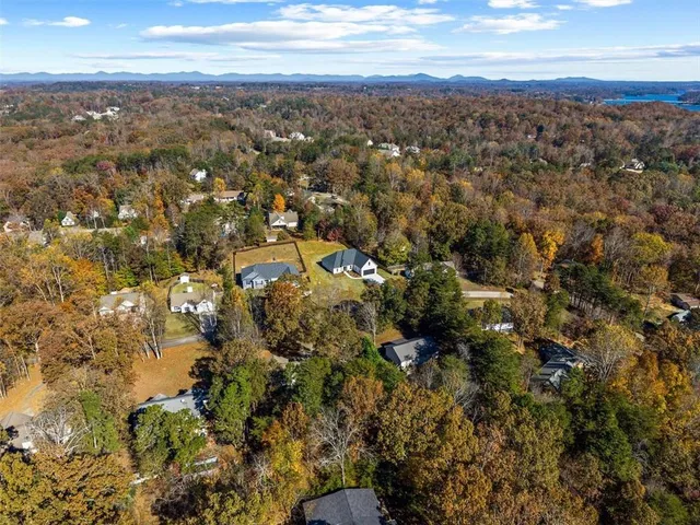 a view of a swimming pool with an outdoor space and seating area