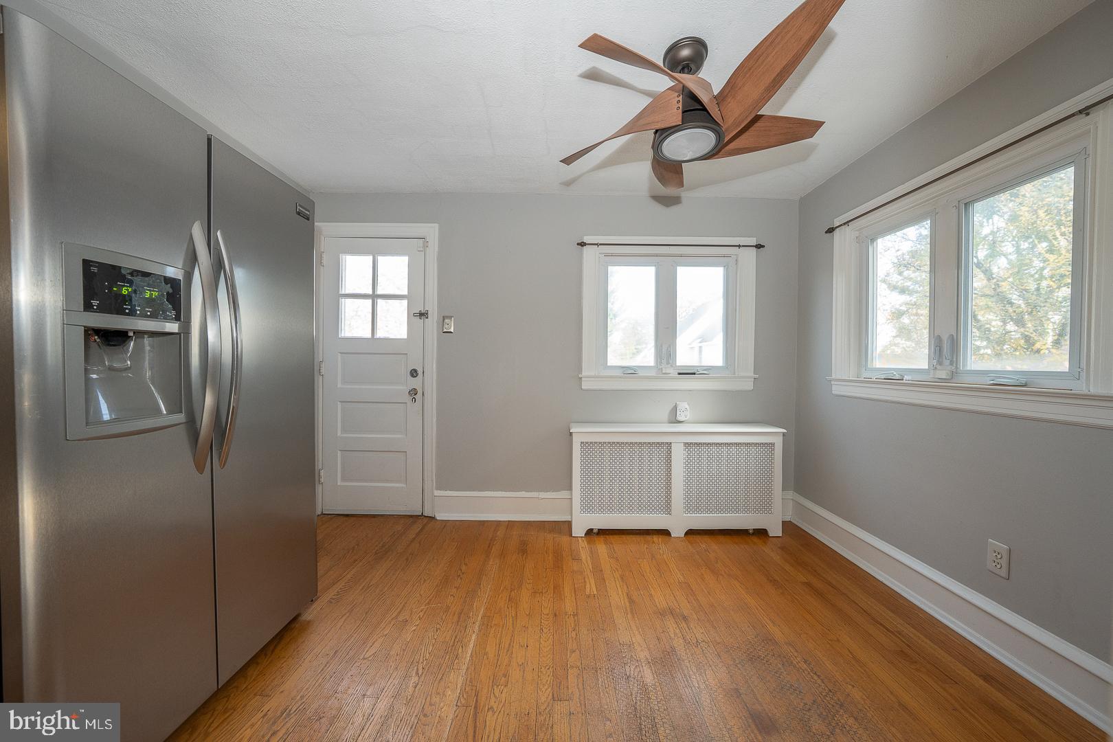 2939 Berkley Road Ardmore, PA 19003 - Photo 11 of 37 a view of an empty room with a window and wooden floor