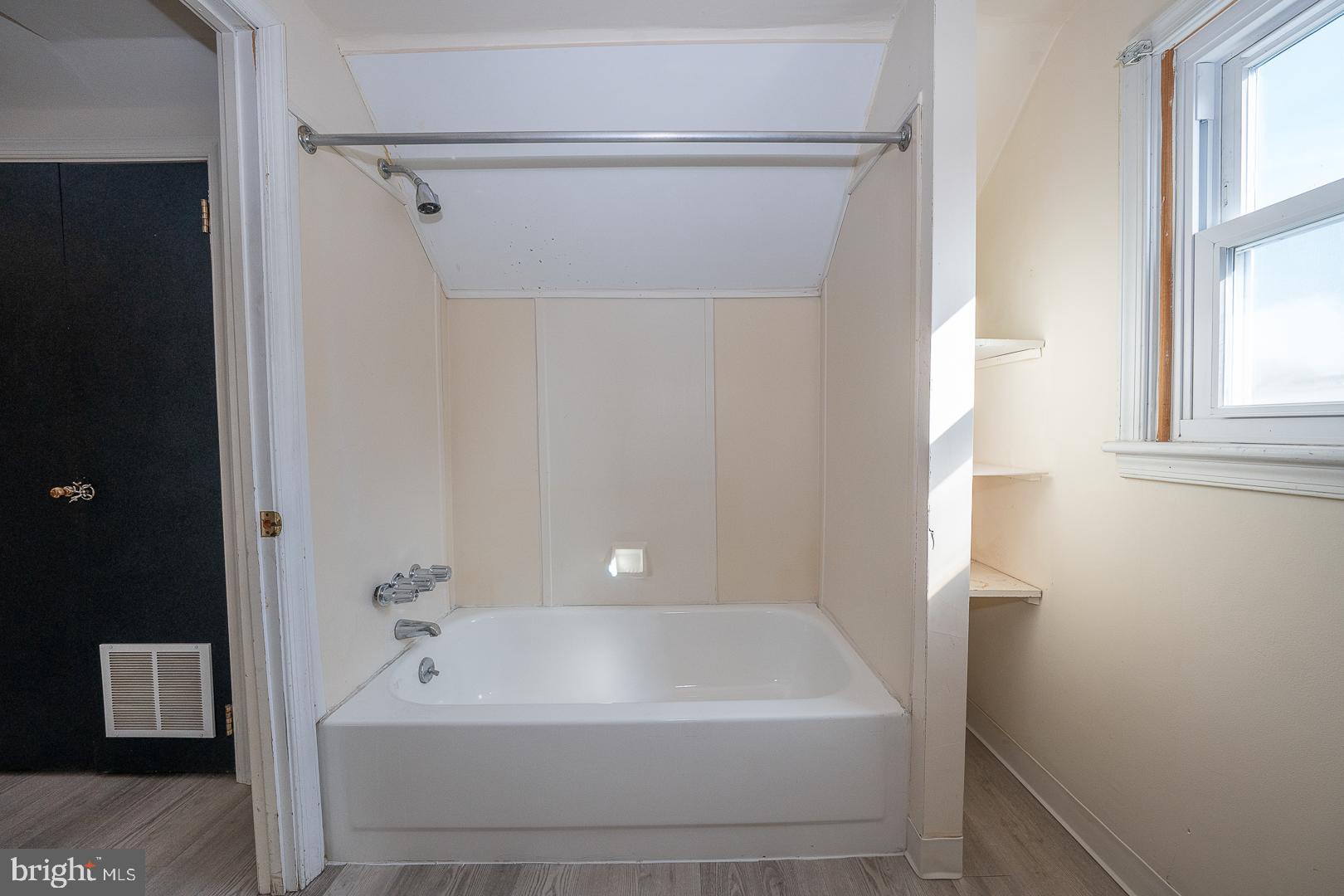 2939 Berkley Road Ardmore, PA 19003 - Photo 30 of 37 a bathroom with a bathtub and shower