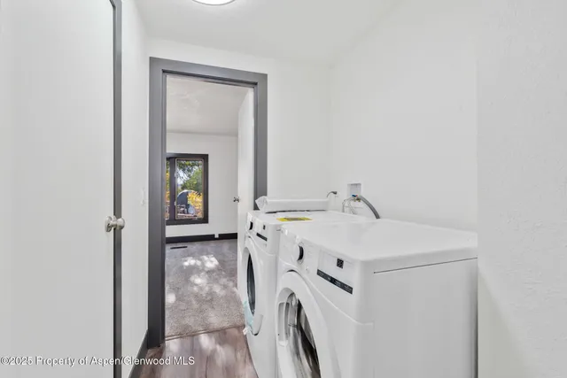 a room with a sink and granite