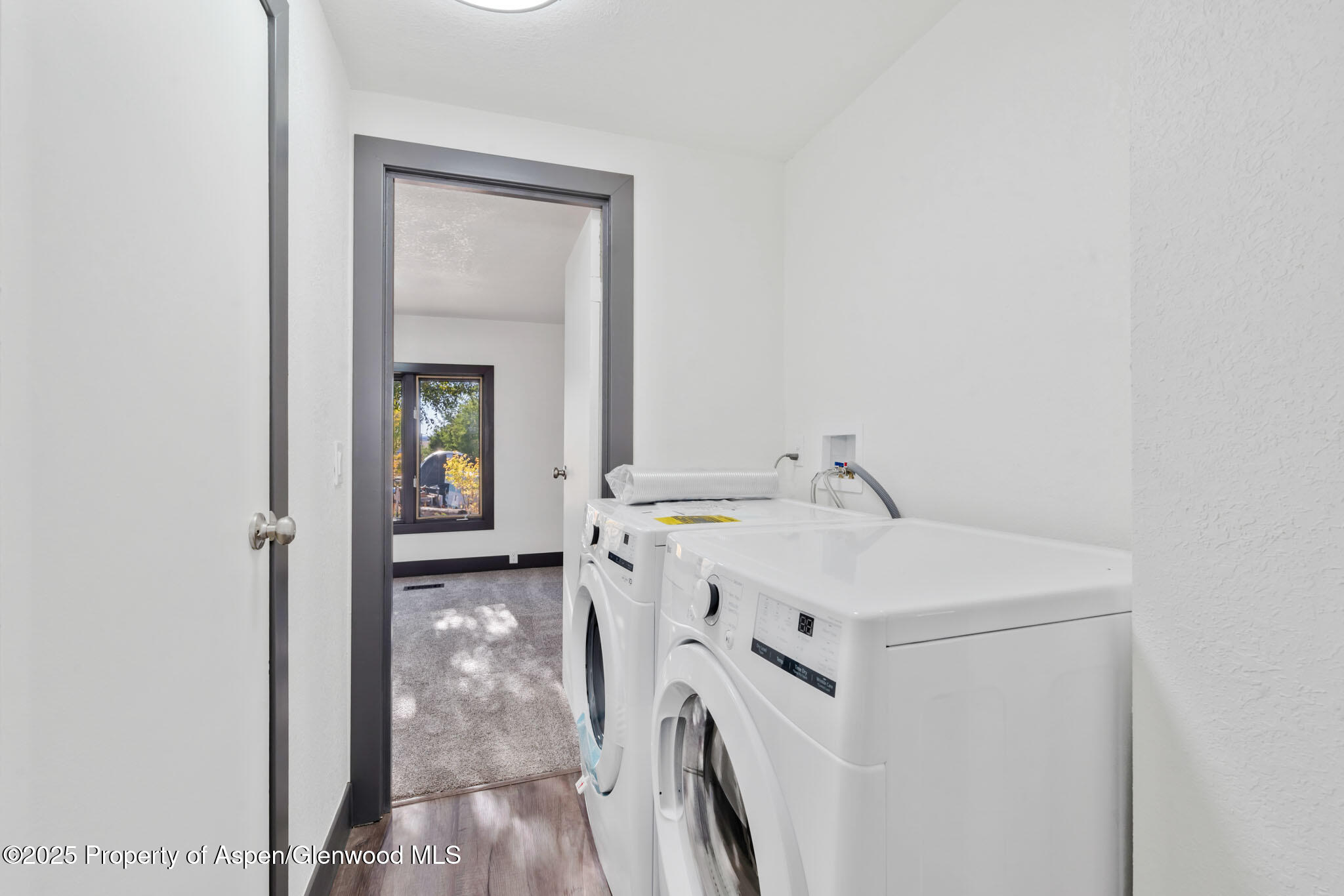 295 South Spruce Street Hayden, CO 81639 - Photo 17 of 40 a utility room with dryer and washer