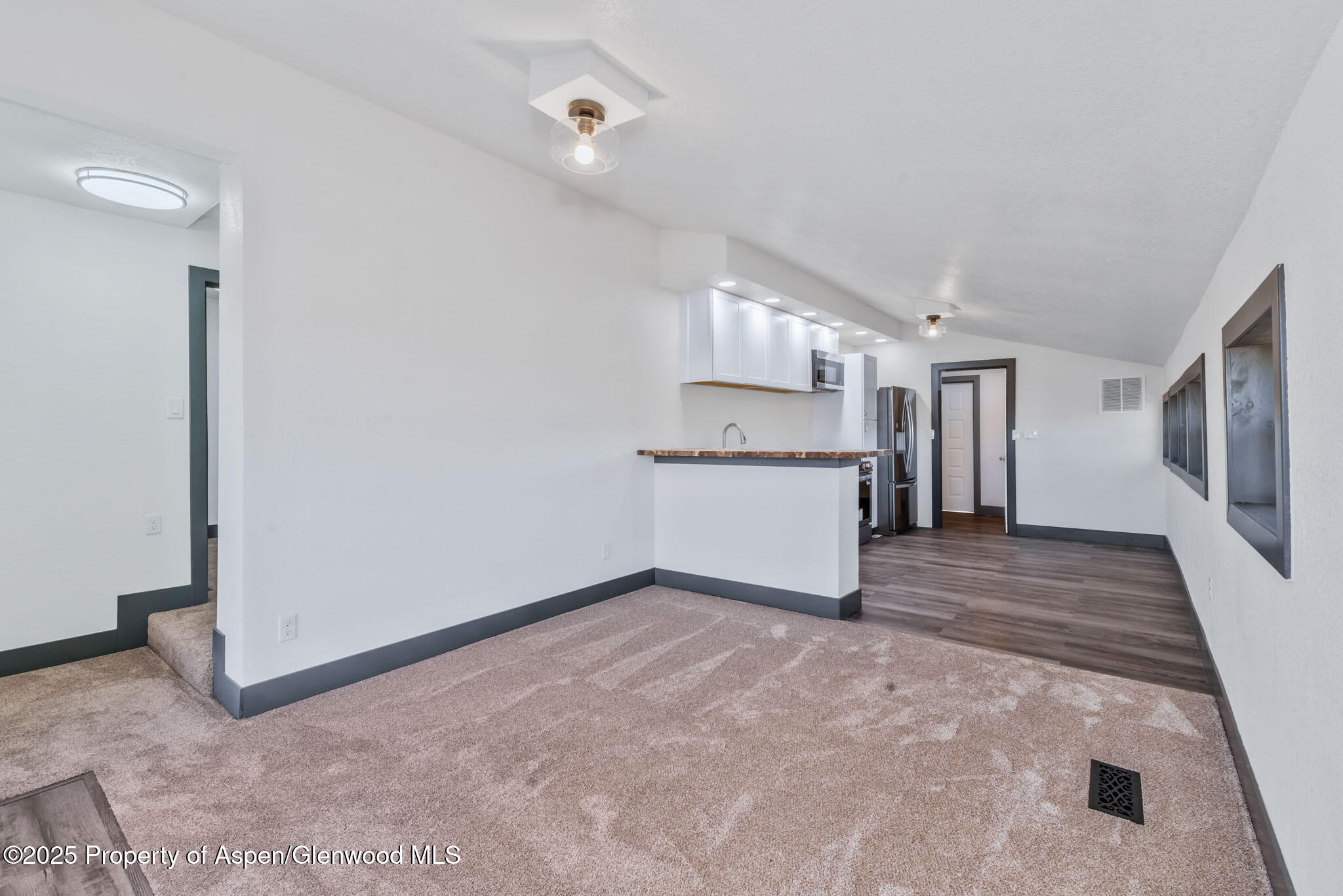 295 South Spruce Street Hayden, CO 81639 - Photo 22 of 40 a view of a kitchen with a sink and a refrigerator