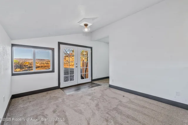 an empty room with window