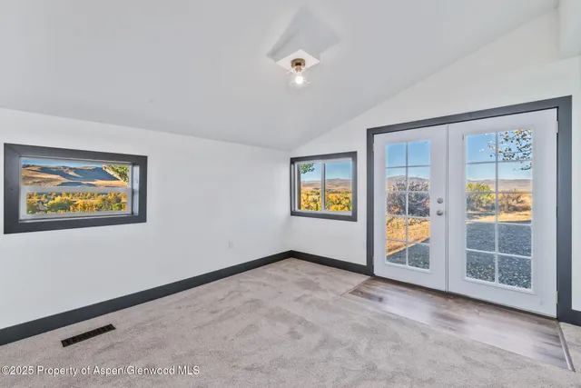 a kitchen with a sink and refrigerator