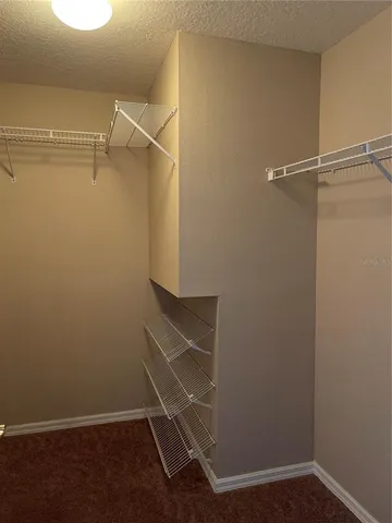 a room with walk in closet