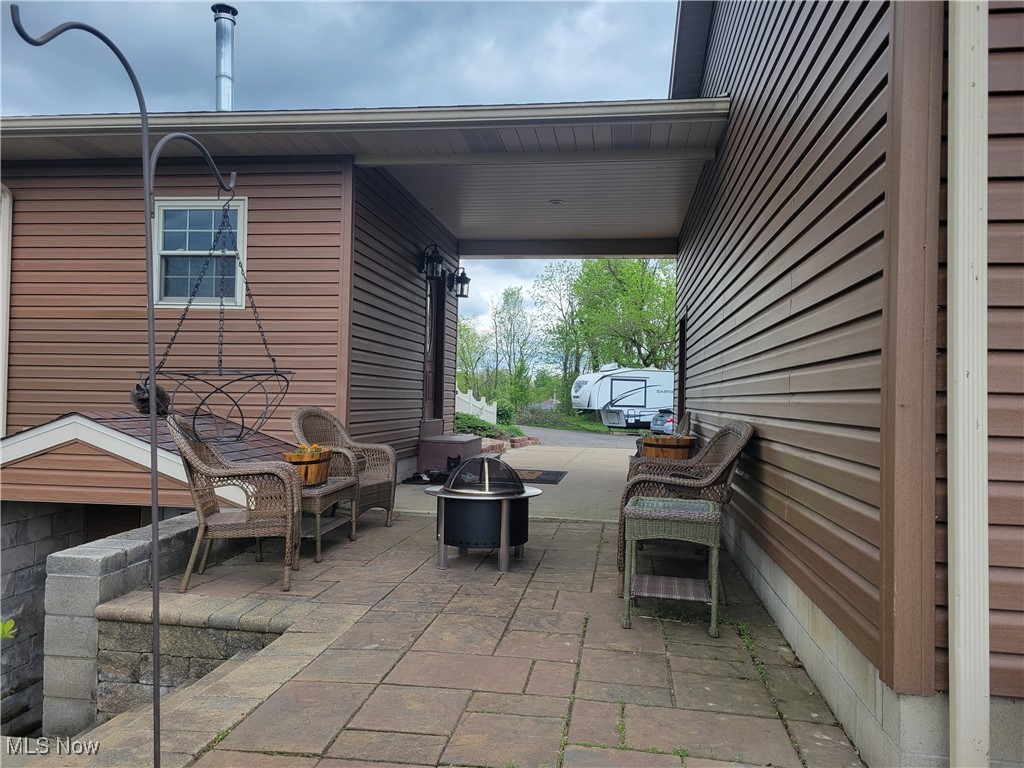 87038 Keyser Road Cadiz, OH 43907 - Photo 3 of 50 breezeway and patio