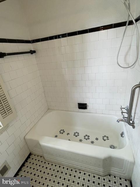7228 Lanark Road Baltimore, MD 21212 - Photo 11 of 16 a bathroom with a sink and a bathtub