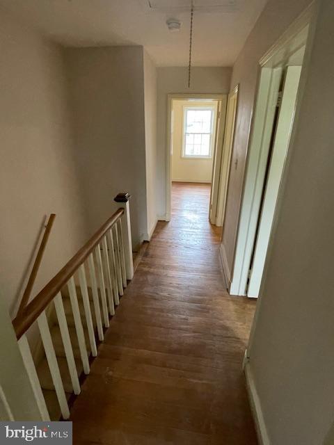 7228 Lanark Road Baltimore, MD 21212 - Photo 12 of 16 a view of a hallway with wooden floor and stairs