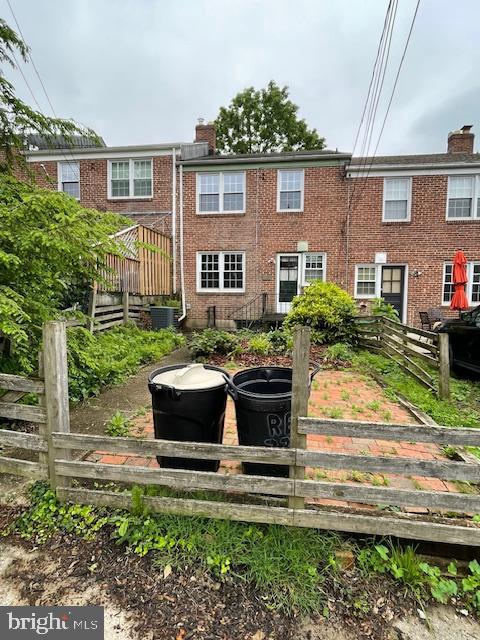 7228 Lanark Road Baltimore, MD 21212 - Photo 2 of 16 a front view of a house with a yard