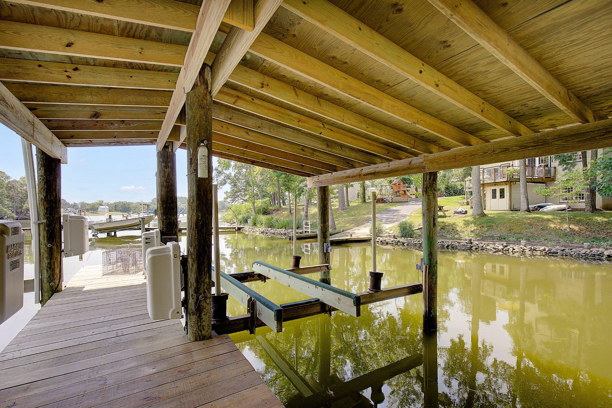 980 Apple Lane Solomons, MD 20629 - Photo 78 of 82 Charming lakeside dock retreat.